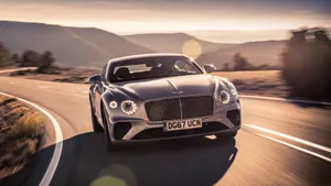 Immaculate Bentley Continental Gt Exuding Luxury And Performance Wallpaper