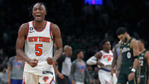 Immanuel Quickley Celebrates Knicks Victory Wallpaper