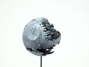 Imperial Fleet Floats In Space Over The Planet-destroying Death Star Ii Wallpaper
