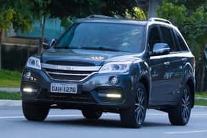 Impressive Lifan Motorcycle On A Scenic Road Wallpaper