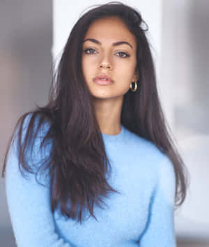 Inanna Sarkis Blue Sweater Portrait Wallpaper