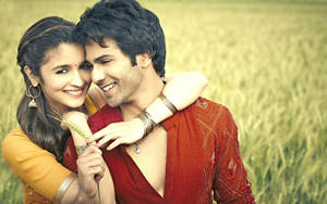 Indian Couple In Green Field Wallpaper