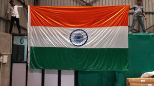 Indian Flag With Two Men Holding Wallpaper