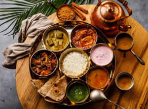 Indian Thali Feast Delicious Variety Wallpaper