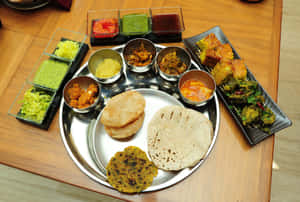 Indian Vegetarian Thali Assortment Wallpaper