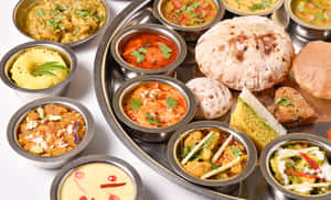 Indian Vegetarian Thali Assortment Wallpaper