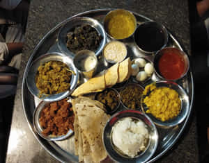 Indian Vegetarian Thali Assortment Wallpaper