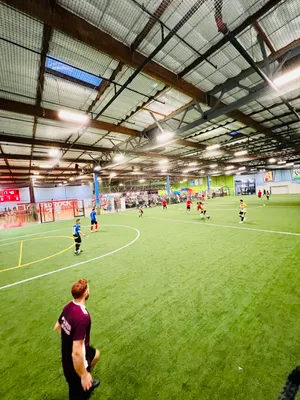 Indoor Soccer Action Arena Wallpaper