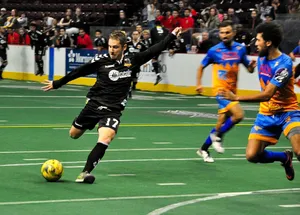 Indoor Soccer Action Shot Wallpaper