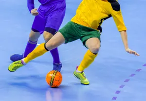 Indoor Soccer Action Shot Wallpaper