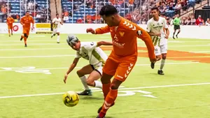 Indoor Soccer Action - Striking The Ball Wallpaper