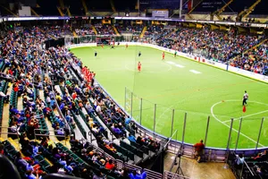Indoor Soccer Game In Action Wallpaper