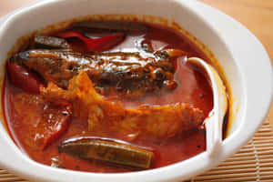 Indulge In The Aromatic Delight Of Fish Head Curry Wallpaper