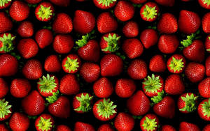 Indulge In The Sweetness Of Stawberries Wallpaper