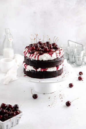 Indulgence Is Key: Satisfy Your Sweet Tooth Today With A Delightful Black Forest Cake. Wallpaper