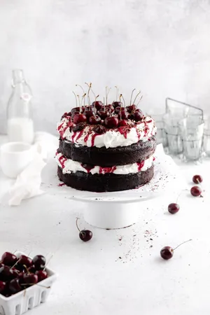 Indulgence Is Key: Satisfy Your Sweet Tooth Today With A Delightful Black Forest Cake. Wallpaper