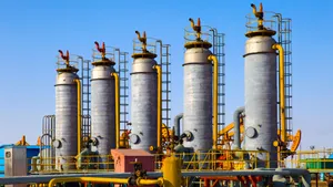 Industrial Vertical Tanksand Piping Wallpaper