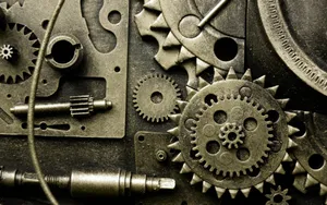 Industrious Metallic Gears In Action Wallpaper