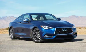 Infiniti Q60: Elegance In Motion Wallpaper