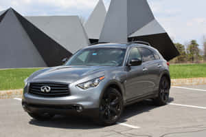 Infiniti Qx70 Luxury Suv Gliding On City Roadways Wallpaper