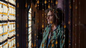 Inherent Vice Scene With Beaded Curtains Wallpaper