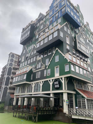 Inntel Hotel Zaandam Under Cloudy Sky Wallpaper