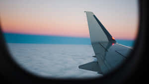 Inside Airplane Overlooking Aircraft Wing Wallpaper