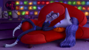 Inside Out Character Relaxingon Couch Wallpaper