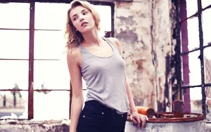 Inspiring Fitness Motivation With Blonde Woman In Athletic Top Wallpaper