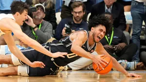 Intense Basketball Game Dive Wallpaper