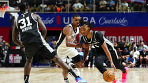 Intense Basketball Match Dribble Wallpaper