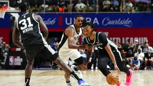 Intense Basketball Match Dribble Wallpaper