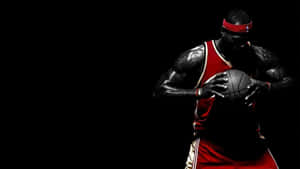 Intense Basketball Player Red Black Wallpaper