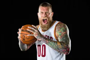 Intense Basketball Player Tattoos Wallpaper