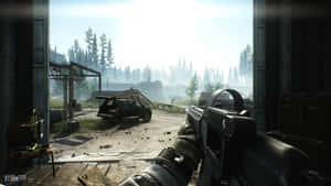 Intense Battlefield Action In A First-person Shooter Game Wallpaper