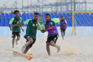 Intense_ Beach_ Soccer_ Training_ Session Wallpaper