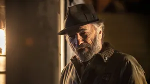 Intense Character Portraitwith Hat Wallpaper