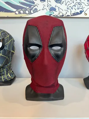 Intense Close-up Of Deadpool's Iconic Mask Wallpaper