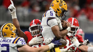 Intense College Football Action Wallpaper