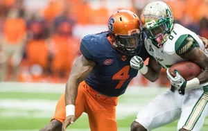 Intense College Football Matchup Wallpaper