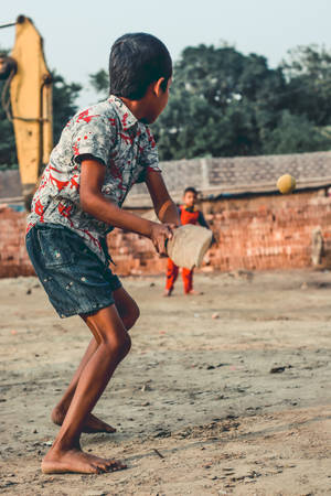 Intense Cricket Match At The Stadium Wallpaper