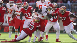 Intense Football Action Kansasvs San Francisco Wallpaper