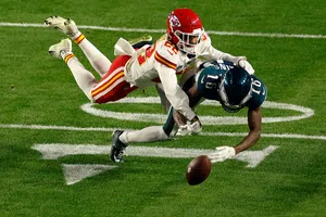 Intense Football Actiononthe Field Wallpaper