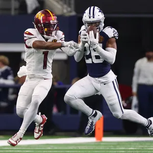 Intense Football Catch Attempt Wallpaper