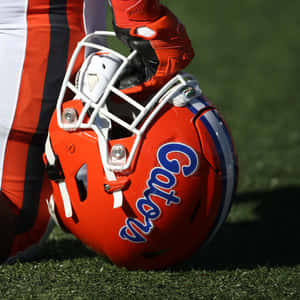 Intense Football Helmet - Ready For Action Wallpaper