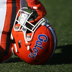 Intense Football Helmet - Ready For Action Wallpaper