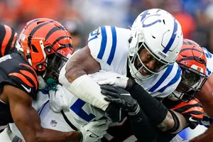 Intense Football Match Tackle Wallpaper