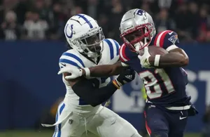 Intense Football Matchup Wallpaper