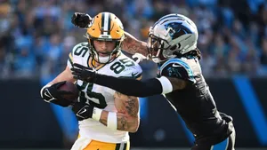 Intense Football Matchup Wallpaper