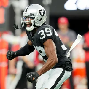 Intense Football Player Celebration Wallpaper